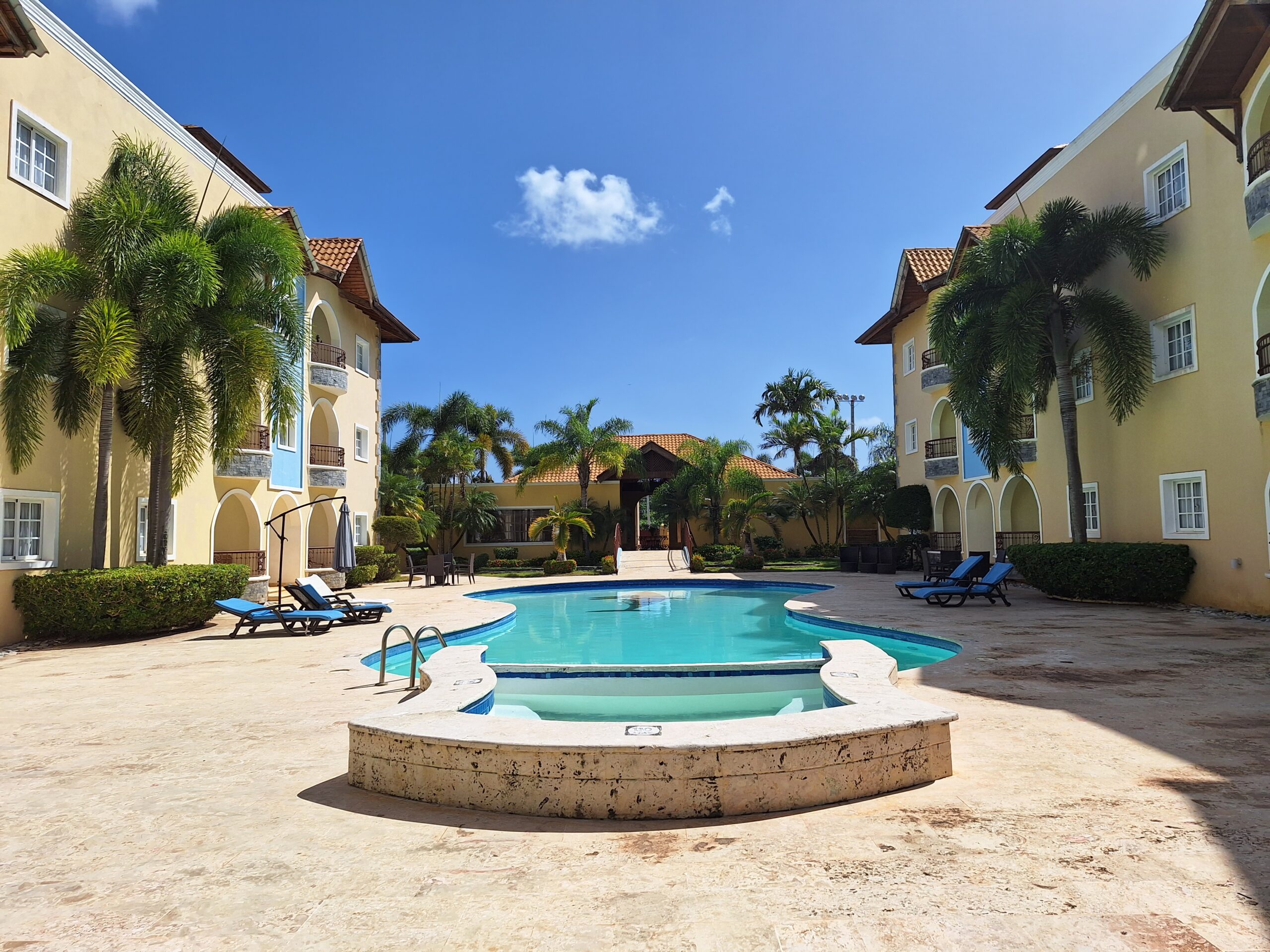 Pool between buildings.